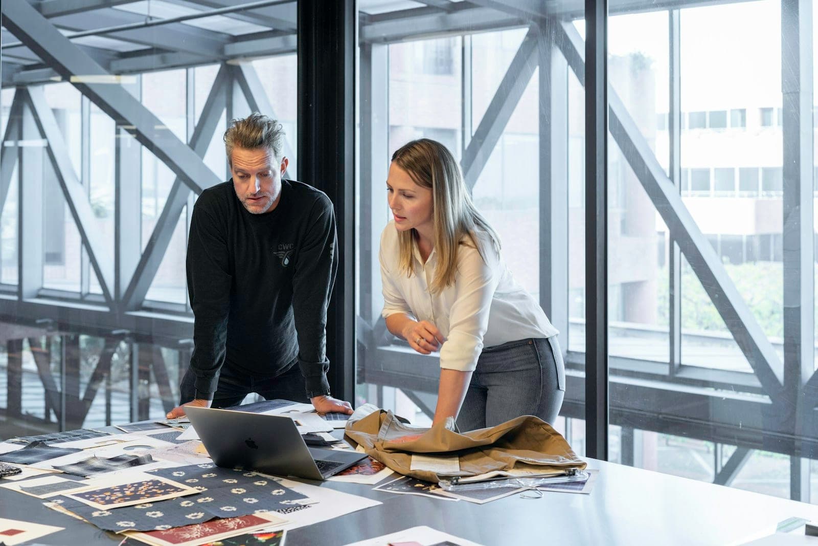 Consultants in a meeting reviewing a proposal