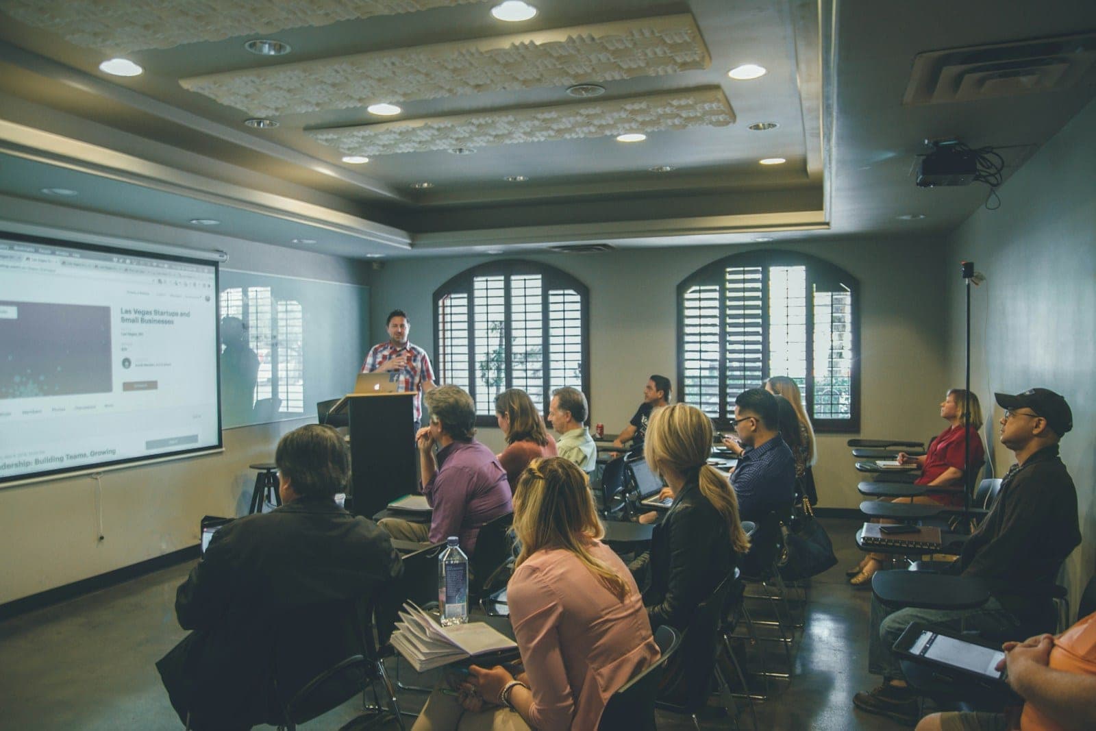 A trainer leading a modern classroom session